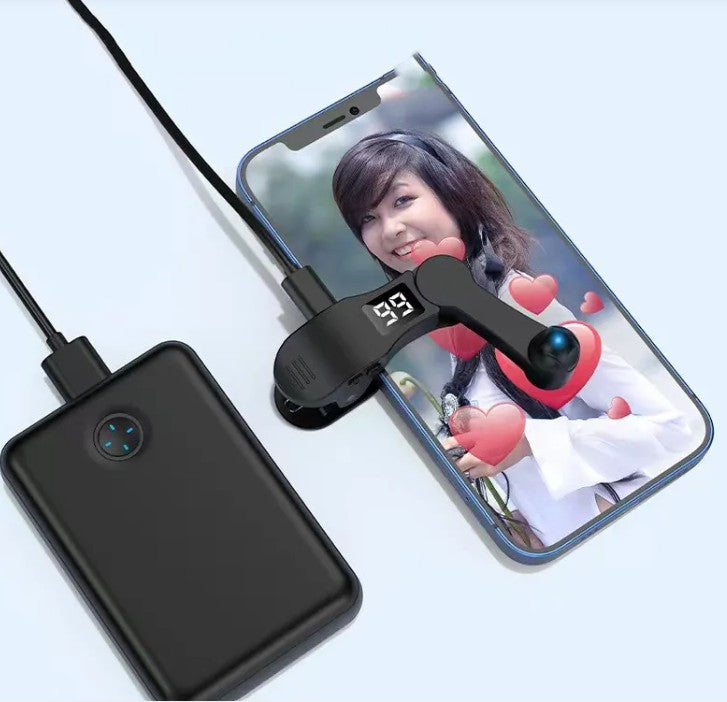 Creative Vault Marketplace auto screen clicker device attached to a smartphone screen with a digital display