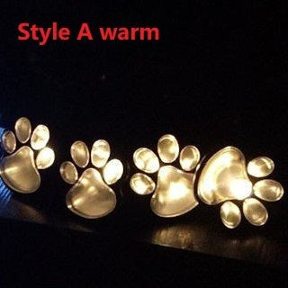 Creative Vault Marketplace solar-powered bear paw garden lights in warm white glowing in the dark