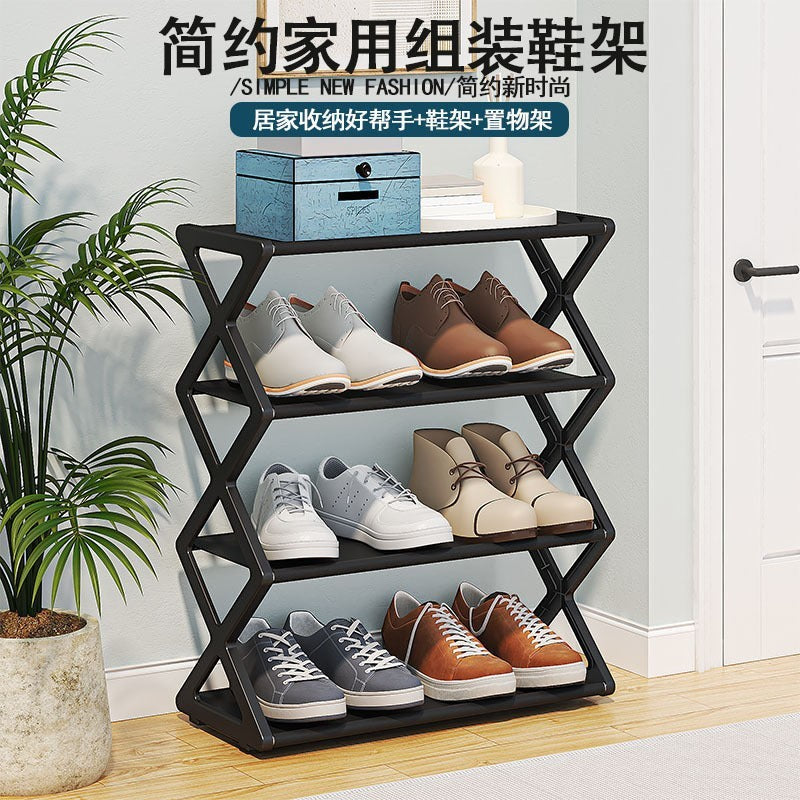 Creative Vault Marketplace black metal 3-tier X-frame shoe rack holding various sneakers in a modern home entryway