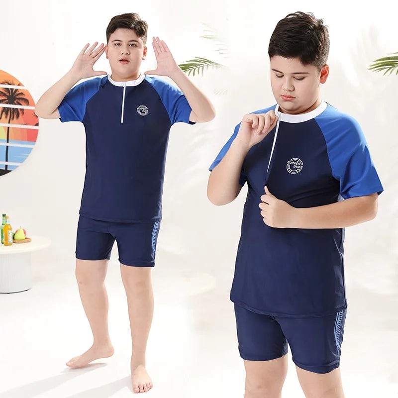 Creative Vault Marketplace boys plus size two-piece navy and blue short-sleeve swim set with matching swim cap