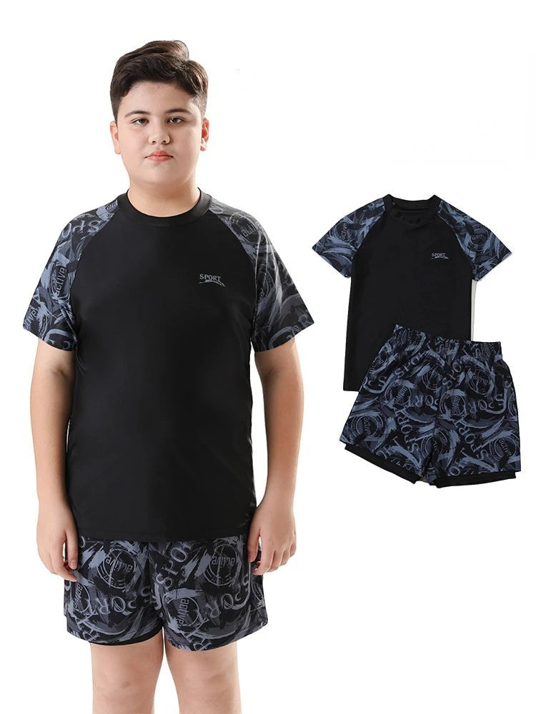 Creative Vault Marketplace boys two-piece black and grey patterned short-sleeve swimwear set with matching swim cap