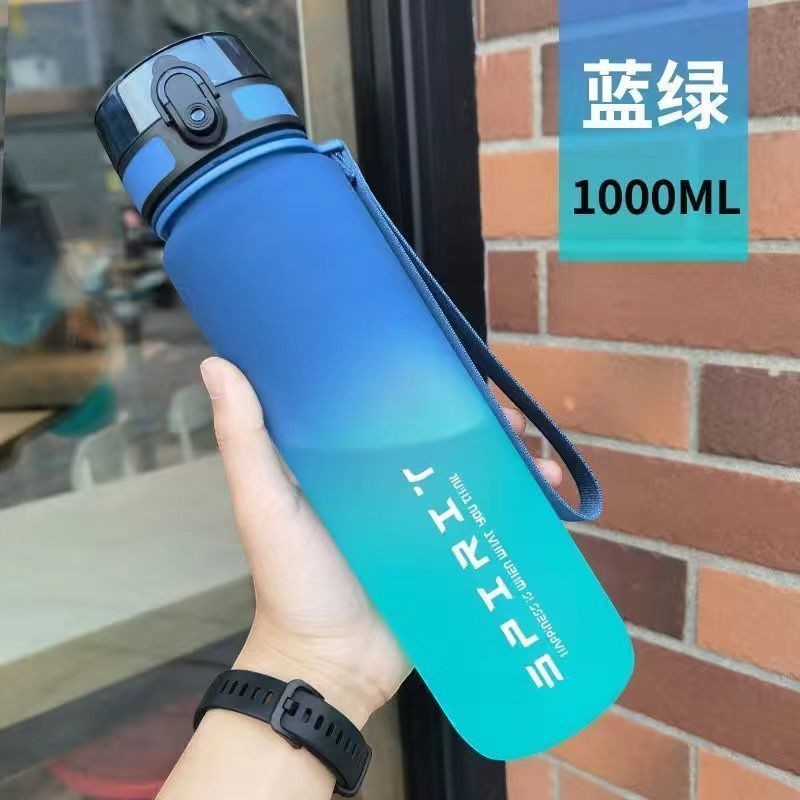 Creative Vault Marketplace 1000ml gradient blue sports water bottle with a secure flip-top lid and carrying strap.