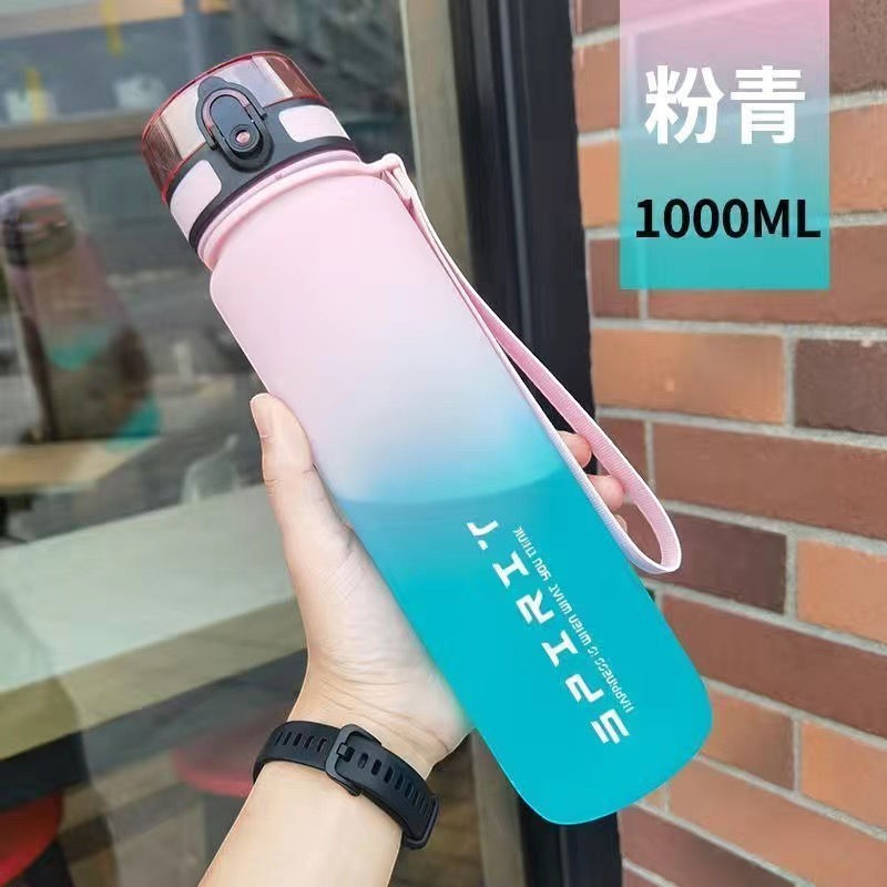 Creative Vault Marketplace 1000ml gradient pink and blue sports water bottle with a secure lid and carrying strap