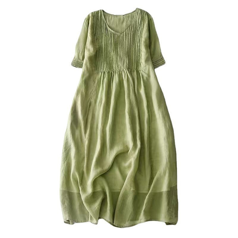 Creative Vault Marketplace green cotton linen midi dress with V-neck, half sleeves, and vintage organ pleated bodice.